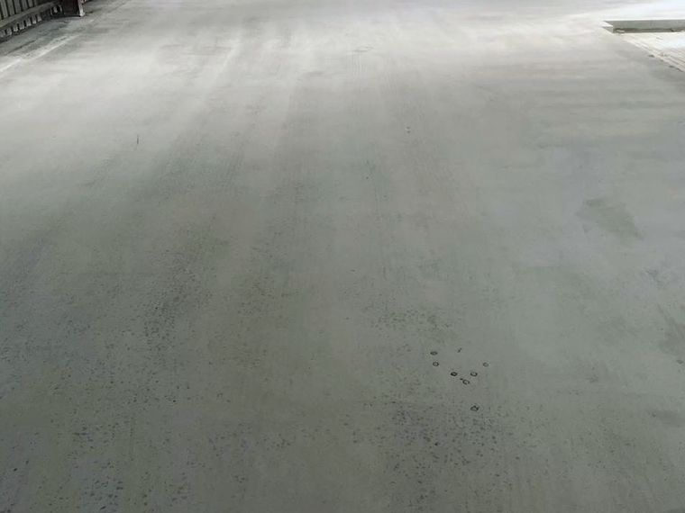 Warehouse floor being ground and prepared