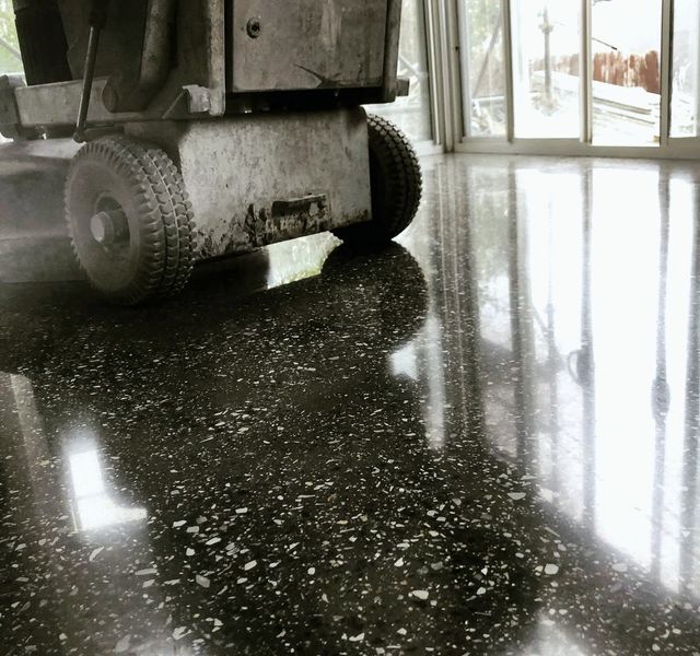 Concrete prepared and finished as polished concrete