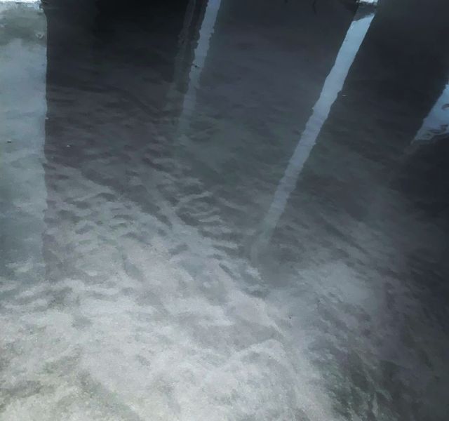 Concrete prepared and coated with epoxy