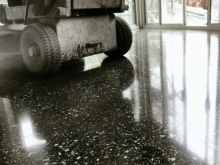 High-gloss polished concrete floor in a residential room