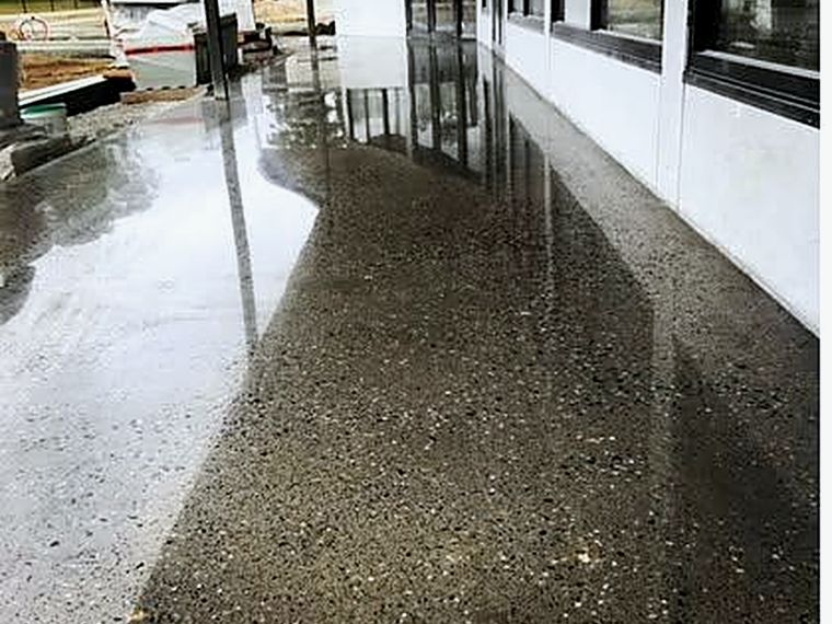 Polished and sealed concrete walkway